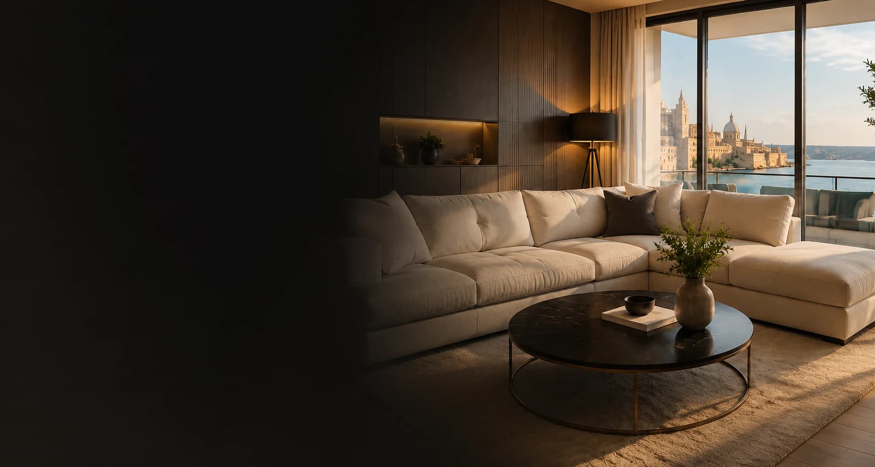 Clean cream fabric sofa in a Malta waterfront home